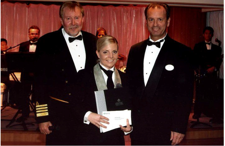 Sumey being awarded “Employee of the Month” on board Crystal Cruises in 2011